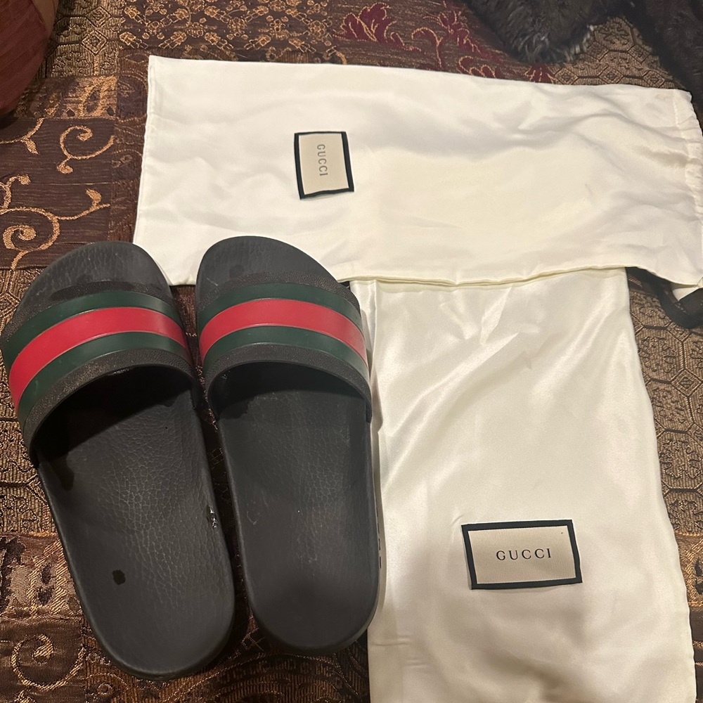 COPY - Like new Gucci slides. Only worn 10 times my son grew out of them